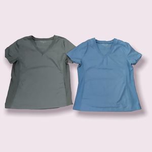 Lot of 2 scrub top size Medium